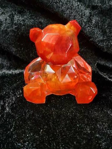Ourson 3D orange et rouge transparent