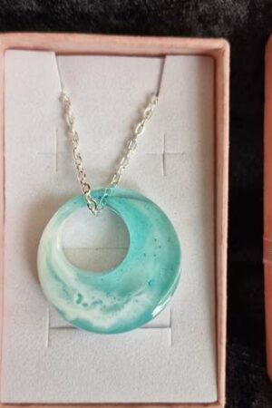 Pendentif rond creux bleu turquoise blanc transparent