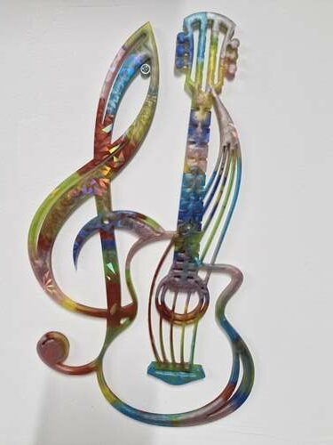 Guitare et sa clef de sol holographique